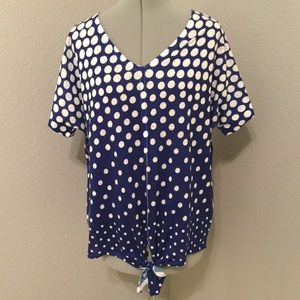 Blue with white polka shirt with tie at the bottom